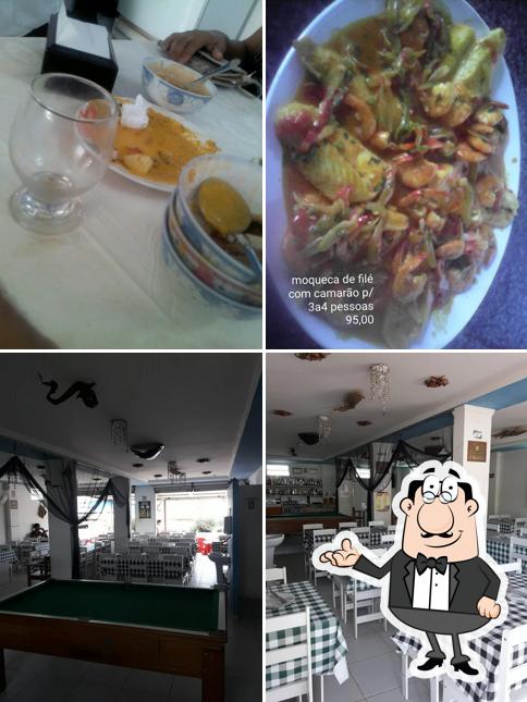 Dê uma olhada a foto ilustrando interior e comida a Du - Comidas da Praia