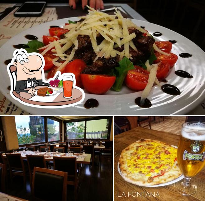 Las imágenes de comedor y cerveza en Ristorante Pizzeria La Fontana da Albert