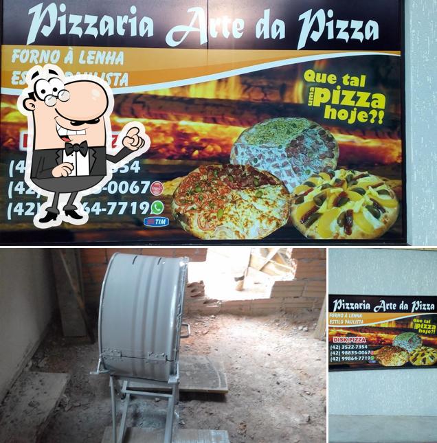 O interior do Pizzaria Arte da Pizza