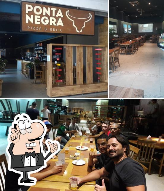 O interior do Ponta Negra Pizza & Grill