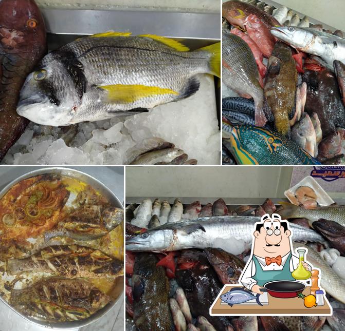 اسماك بورسعيد sert une variété de plats à base de poissons