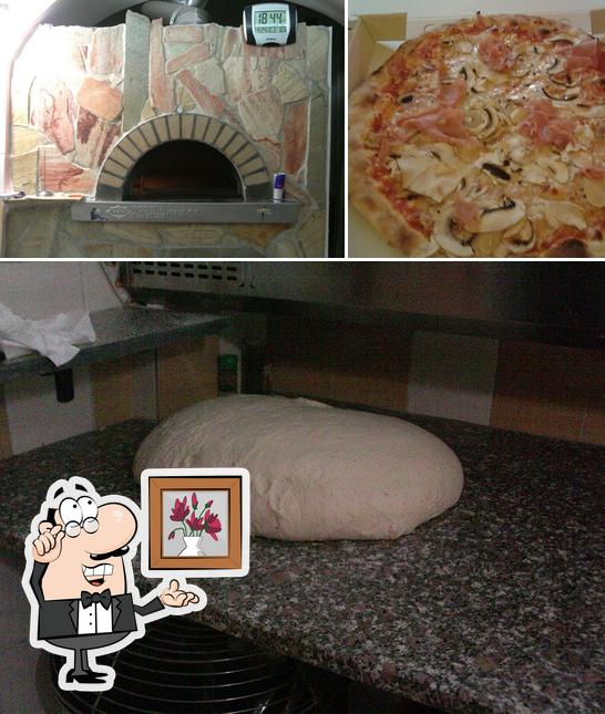 La foto di interni e pizza da Pizzeria su Connottu 2.0