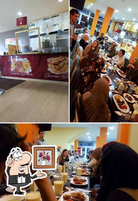 This is the picture showing interior and food at Pak Tandoori Grill & Pizza