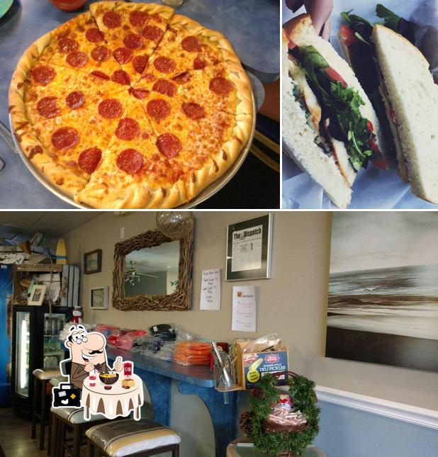 Снимок, на котором видны еда и внутреннее оформление в Surf's Edge Deli & Pizzeria