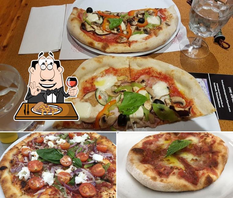 A Pizzeria Capriccio, vous pouvez prendre des pizzas