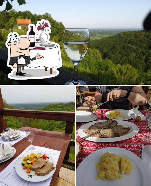 Among different things one can find dining table and wine at Seosko Gospodarstvo "Slavagora"