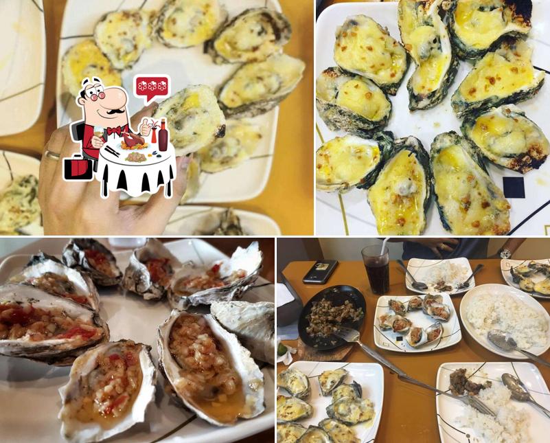 Get various seafood meals available at Charcoal Boy