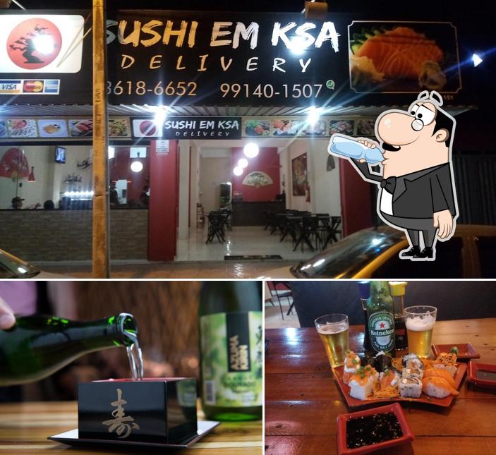 Confira a imagem mostrando bebida e exterior no Sushi Em Ksa Delivery