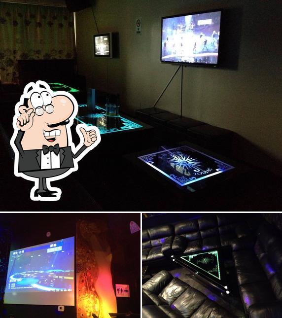 Take a seat at one of the tables at Zodiac Karaoke and Pub KTV