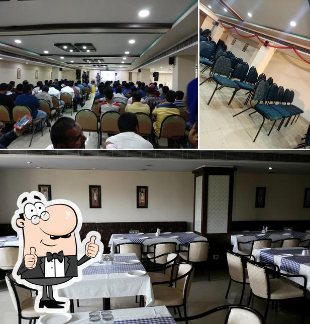 Look at the photo of GHUNGROO RESTURANT AND BANQUET HALL