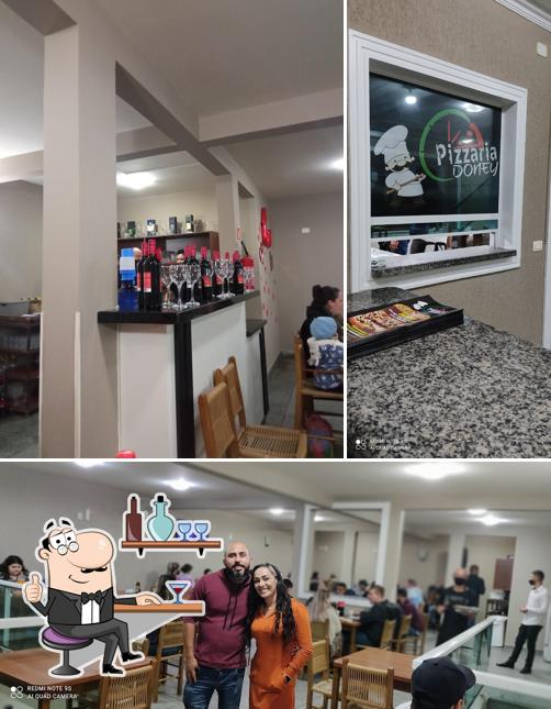 O interior do Pizzaria Doney loja 2 csu