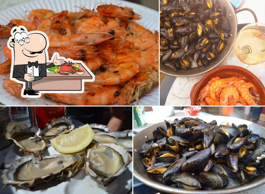 Essayez des fruits de mer à Tapas'oif