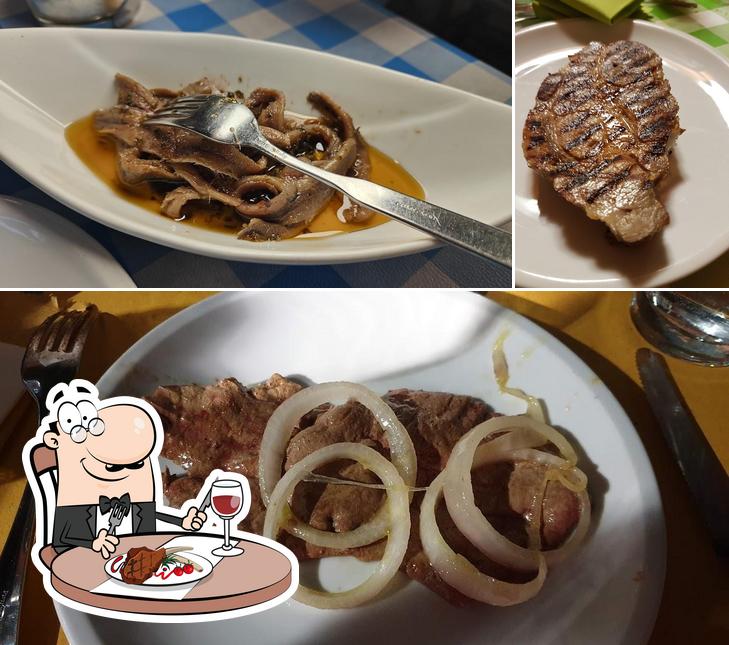 Scegli i piatti di carne a Trattoria Enoteca Madonna Di Como