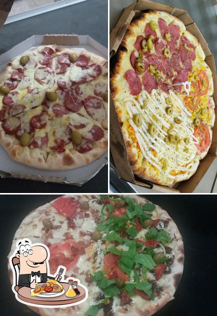 Experimente pizza no Cantinho Da Pizza.406 Norte