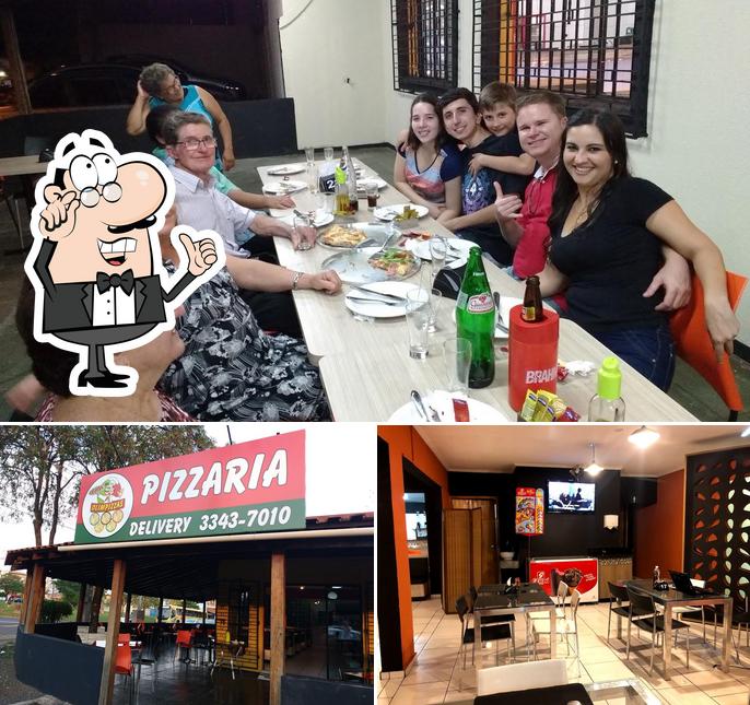 O interior do Divina Pizza e Burguer