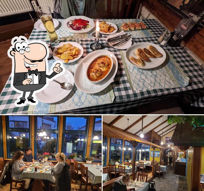Nehmt an einem der Tische im Taverna LINDOS Griechisches Restaurant in Hoppegarten Hönow Platz