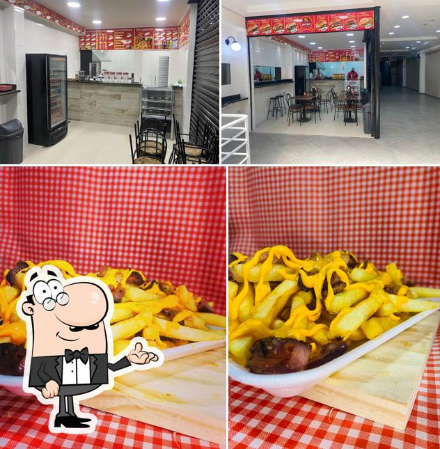 This is the picture showing interior and food at Império lanche e sucos / senador Fonseca 916