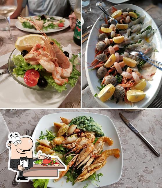 Ordina la cucina di mare a Restavracija Tri Vdove Piran