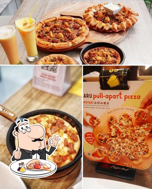 Закажите пиццу в "Pizza Hut Restoran"