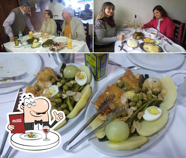 A imagem da comida e mesa de jantar no Restaurante Ca Te Espero