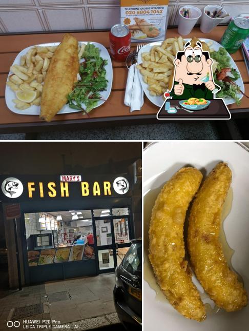 This is the picture showing food and interior at Marys Supreme Fish Bar