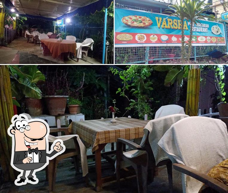 Among different things one can find interior and pizza at Varsha Pure Vegetarian Restaurant