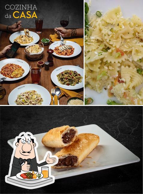 A ilustração do Spoleto’s comida e mesa de jantar