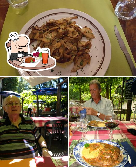 Questa è la foto che mostra la tavolo da pranzo e la carne di Grotto Madonnone