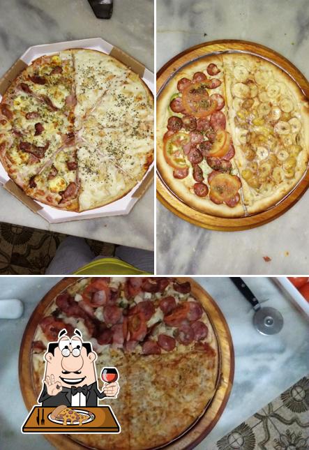 Escolha pizza no Art Pizza Pizzaria