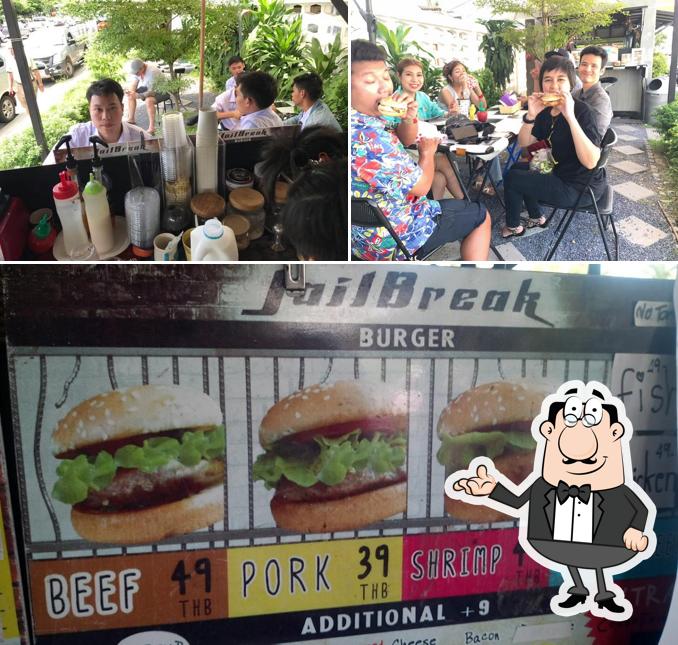 Check out the picture showing interior and burger at JailBreak Burger And Coffee