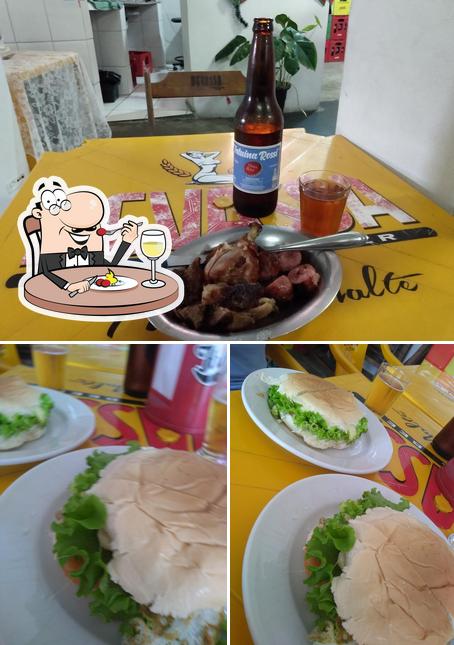 Entre diferentes coisas, comida e cerveja podem ser encontrados no Restaurante e Lanchonete Cantina Bahu