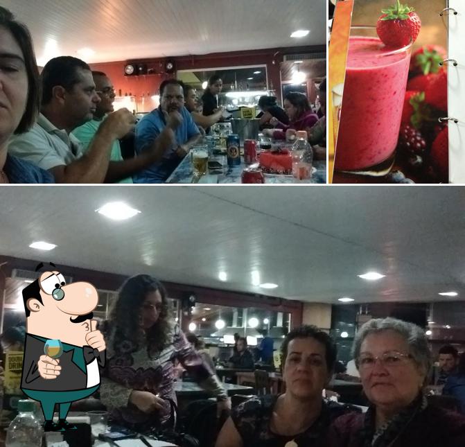 Esta é a imagem apresentando balcão de bar e bebida no Cidade Grill