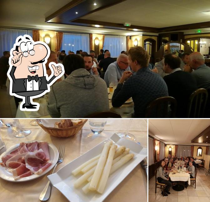 Observa las fotos que muestran interior y comida en Hôtel Restaurant le Cheval Blanc