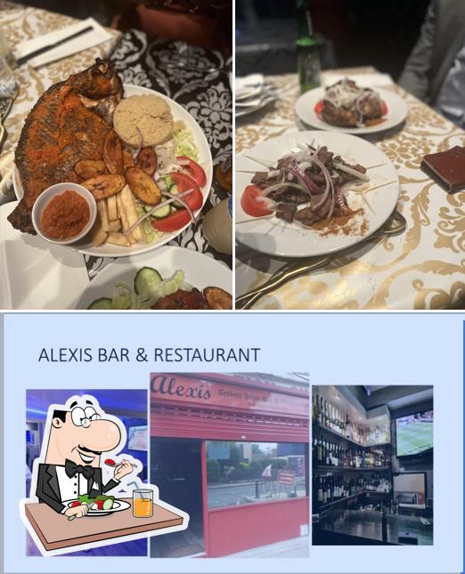 Check out the picture displaying food and interior at Alexis Suya Grill & Bar