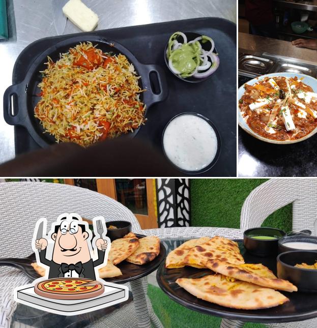 Order pizza at Biryani Queen