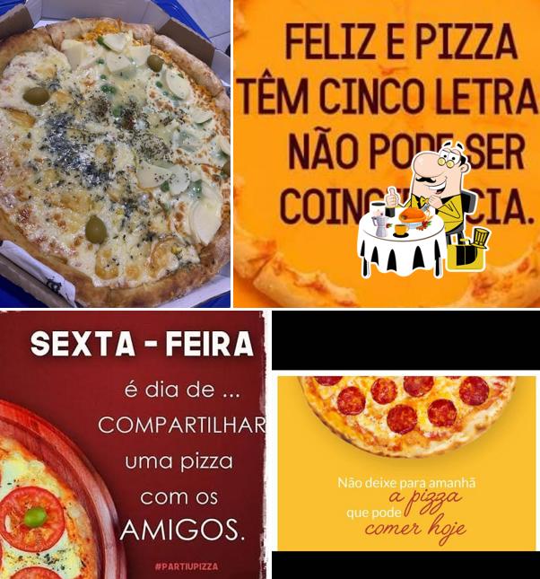 Comida em Pizzaria Tata