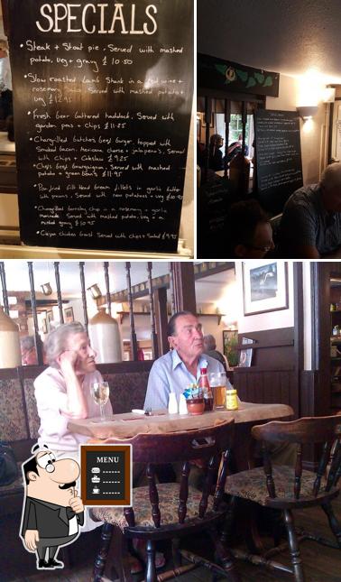 The restaurant's blackboard and dining table