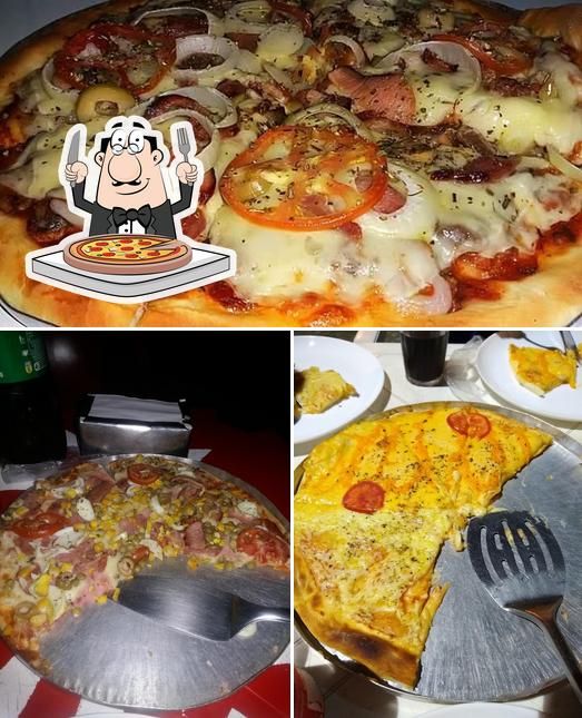 Experimente pizza no Henriques De Itaocara Lanchonete E Pizzaria