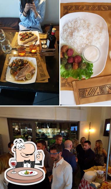Questa è la immagine che presenta la cibo e tavolo da pranzo di Jem Cafè Busto Arsizio