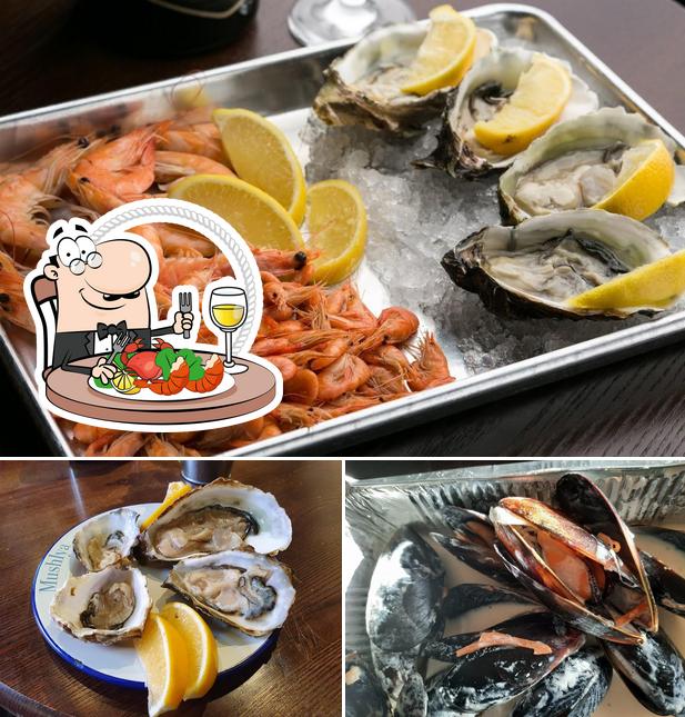 Try out various seafood meals offered by Mushlya