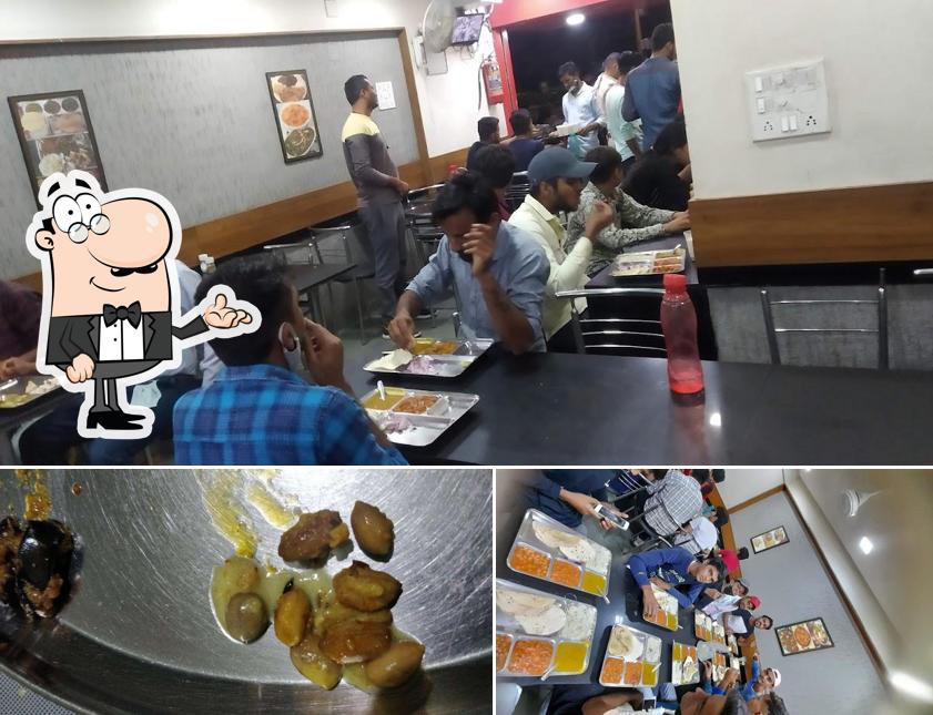 This is the image showing interior and food at Hari Om Chhole Puri