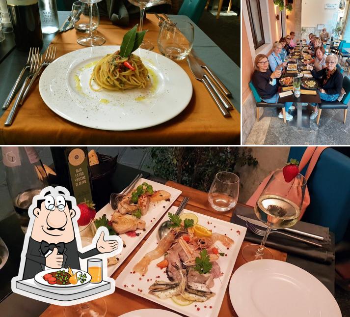 Ferrara Restaurant & Lounge si caratterizza per la cibo e tavolo da pranzo