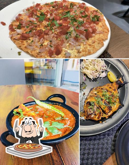 Pick pizza at Kali Mirch Cafe & Restaurants