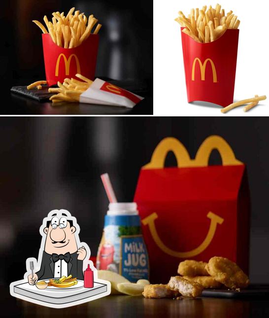 Taste French-fried potatoes at McDonald's
