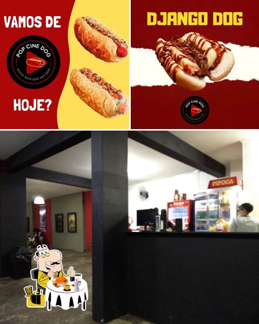 Esta é a imagem mostrando comida e interior no Pop Cine Dog