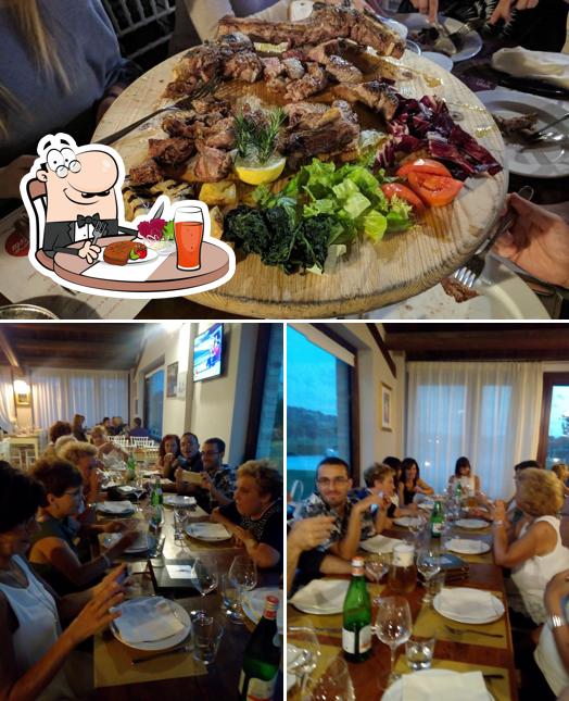 Questa è la immagine che raffigura la tavolo da pranzo e interni di Ristorante Maramao - Pizza & Restaurant