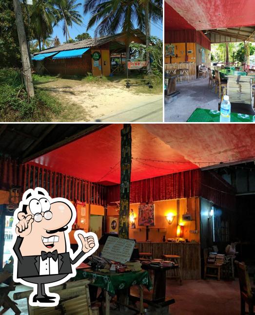 Check out the image depicting interior and exterior at Mama Moon Pizzeria