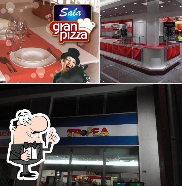 Взгляните на фотографию пиццерии "Gran Pizza"