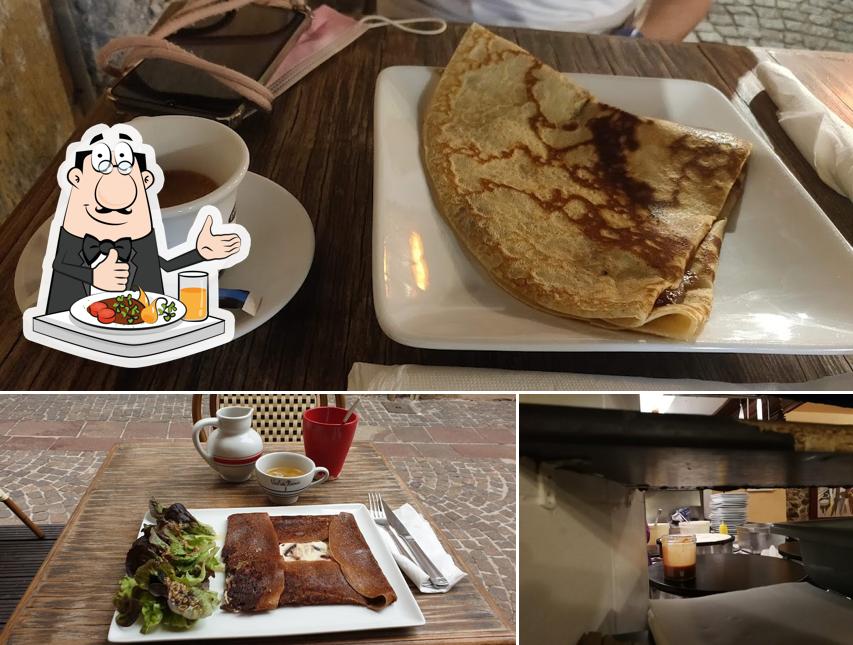 Take a look at the image showing food and interior at La crêperie Tomtom