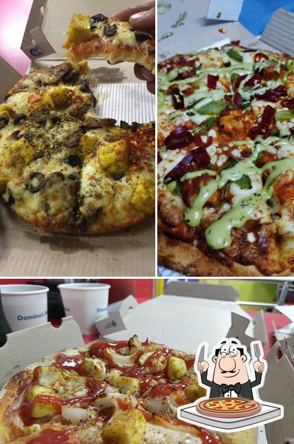 Pick pizza at Domino's Pizza